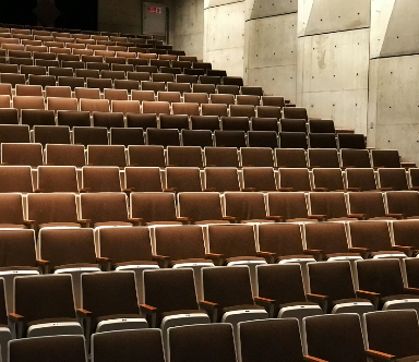 An image of empty auditorium seats